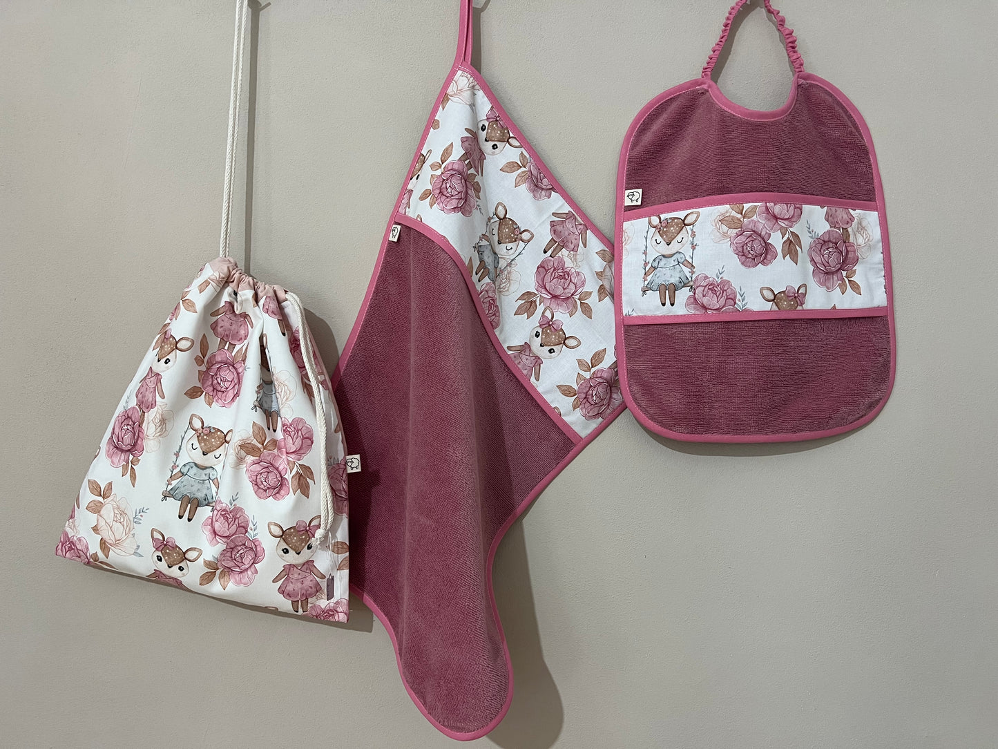 Cerbiatte su altalena